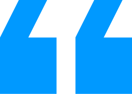 A large green quotation mark on a blue background.