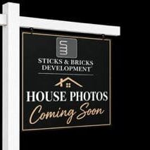 Sign announcing upcoming house photos availability.